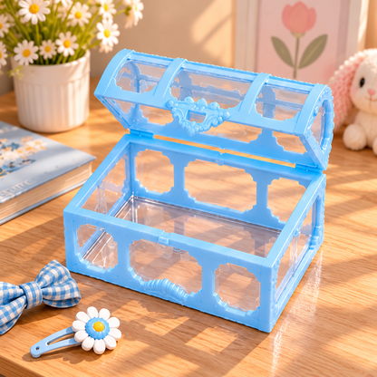 Boîte à bijoux enfant transparente bleue ouverte sur une table